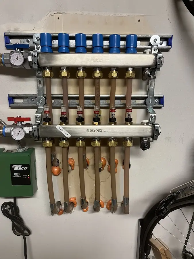 Plumber performing Leak Detection at a residential property in Marquette